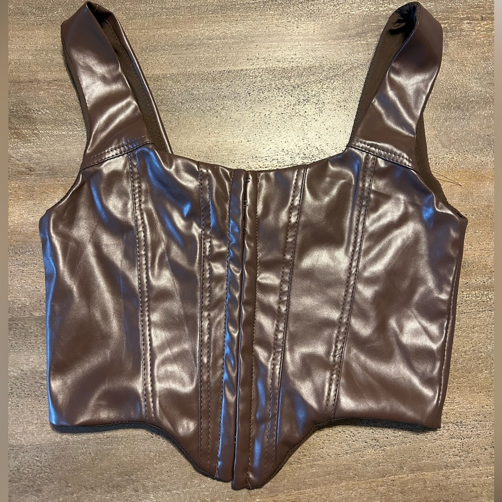 Tatum top brown. Never worn. Nothing wrong with it just does not fit me!